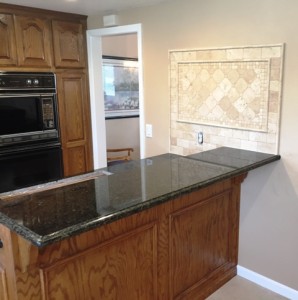 after photo of granite counter and backsplash