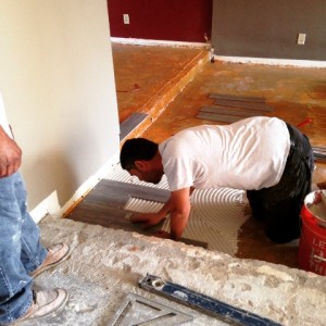 Install of porcelain tile in living room