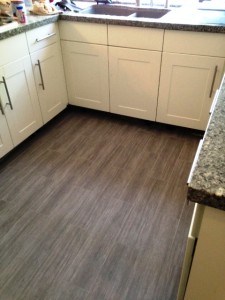 kitchen floor in porcelain wood tile