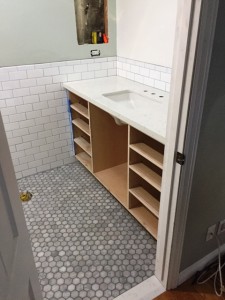 bathroom remodel with glossy tile carrara octagon mosaic and cashmere carrara quartz